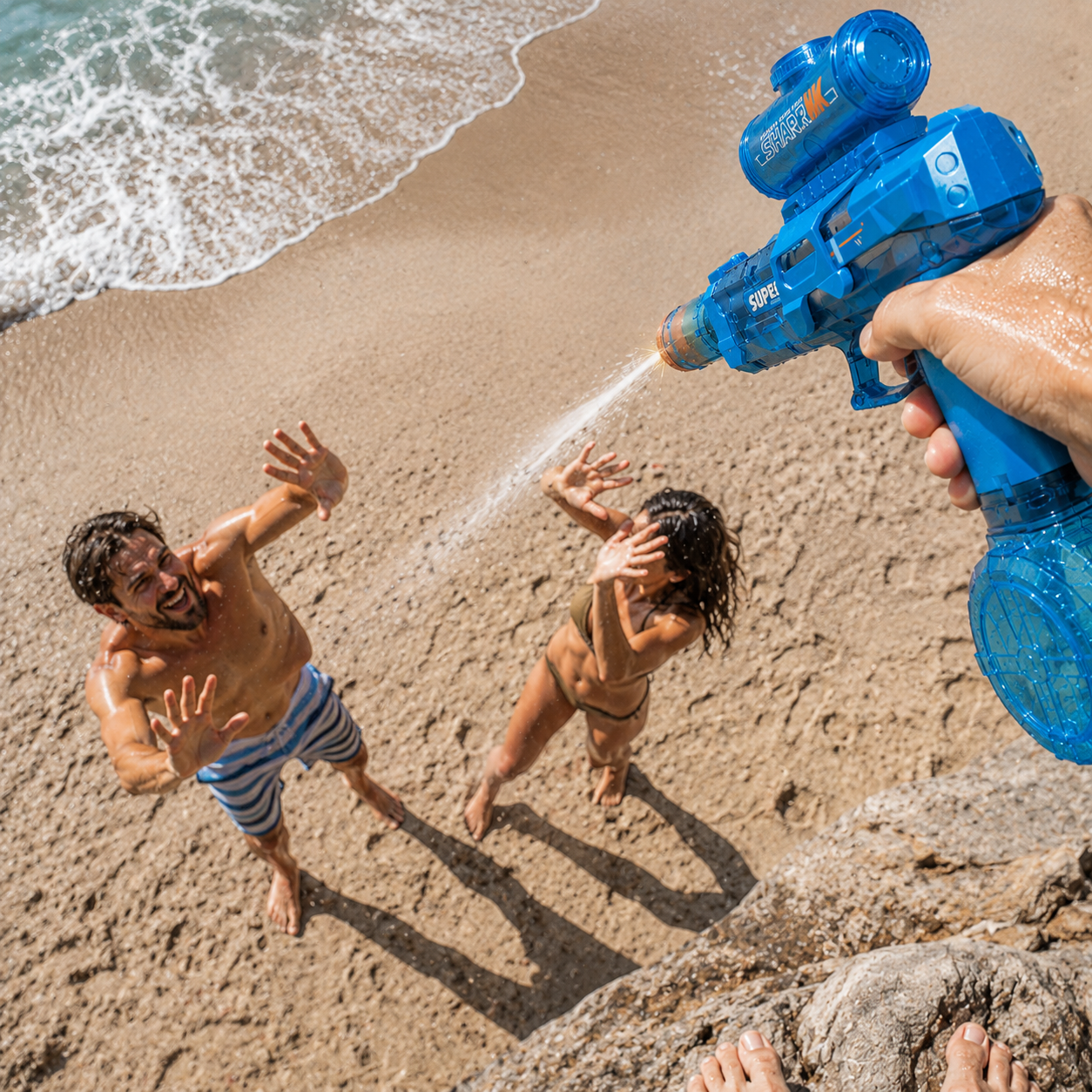 Pistola de Agua – ¡Moja a Todos!